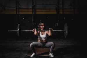 Woman Lifting Heavy Weight Power Clean