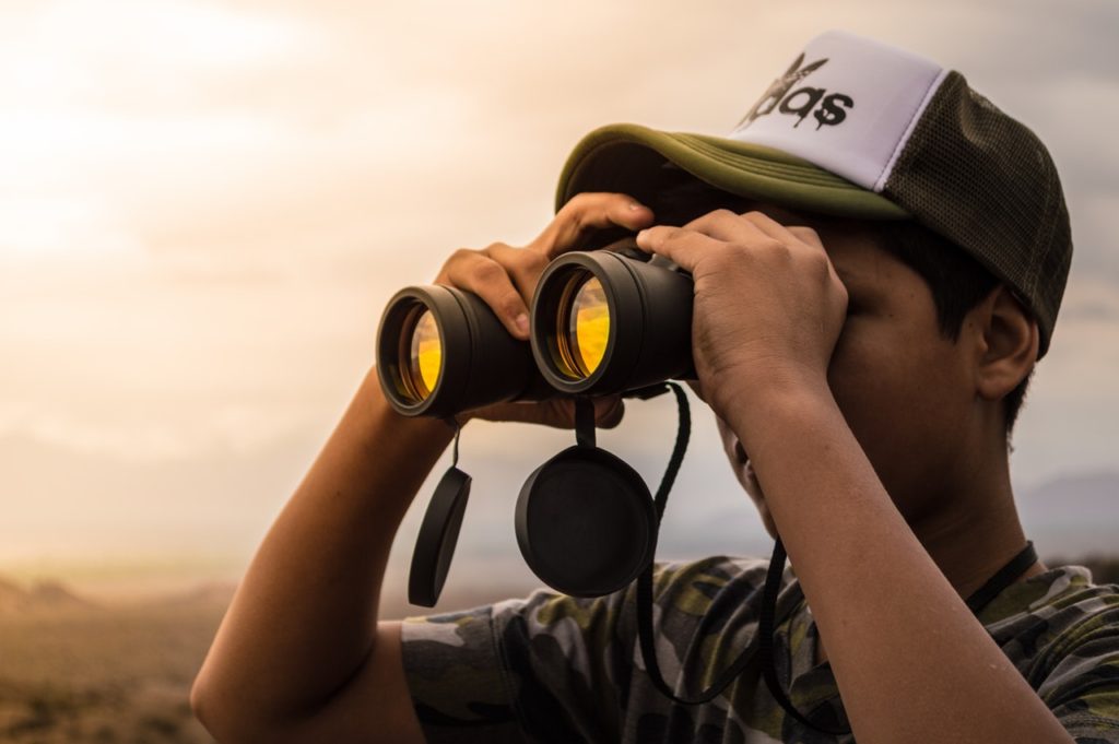 Binoculars On Face Of Guy CLEARLY Looking For A Personal Trainer